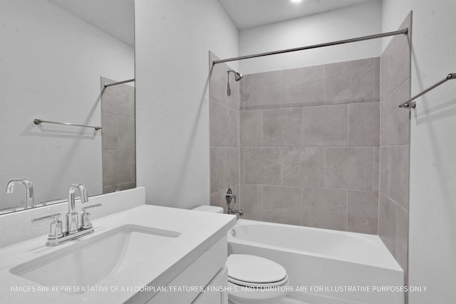 bathroom with toilet, vanity, and  shower combination