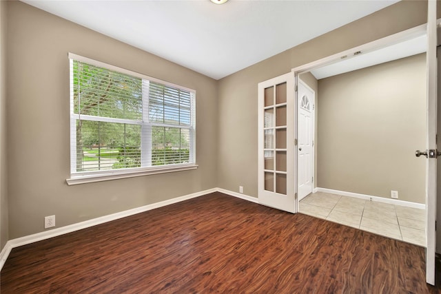 empty room featuring hardwood / wood-style flooring