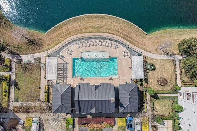 drone / aerial view featuring a water view