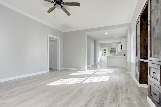 unfurnished living room with crown molding, ceiling fan, and light hardwood / wood-style floors