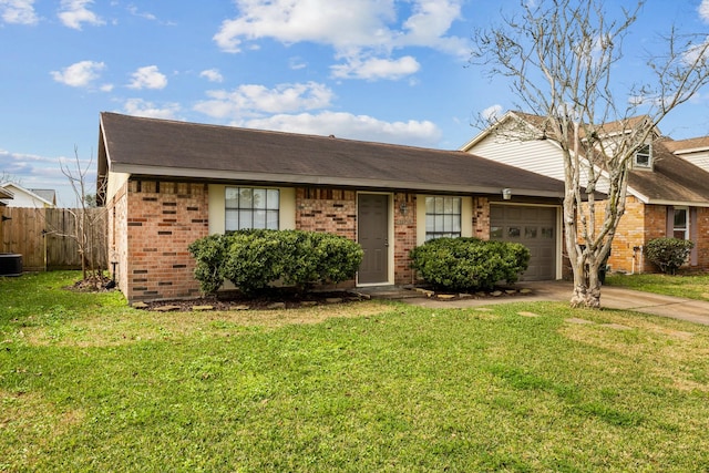 single story home featuring a garage, driveway, fence, a front lawn, and brick siding