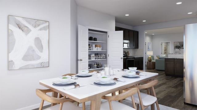 dining space with dark hardwood / wood-style floors