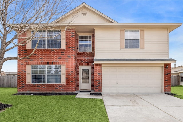 view of front facade with a garage and a front yard