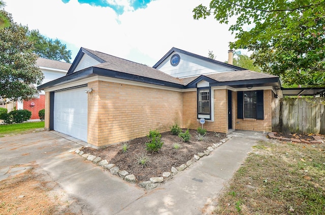 single story home with a garage