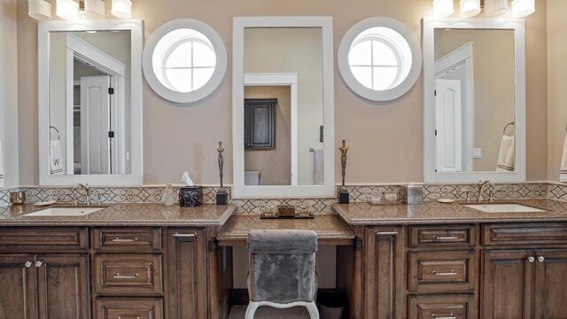 3450 Smiths Pt, Crystal Beach, TX 77650 - bathroom with tasteful backsplash and vanity