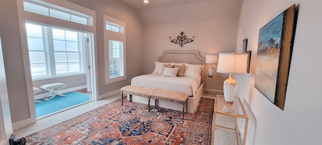 3450 Smiths Pt, Crystal Beach, TX 77650 - bedroom with access to exterior and carpet flooring