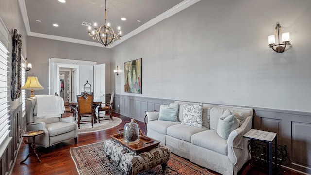 3450 Smiths Pt, Crystal Beach, TX 77650 - living room featuring dark hardwood / wood-style flooring, a notable chandelier, and crown molding