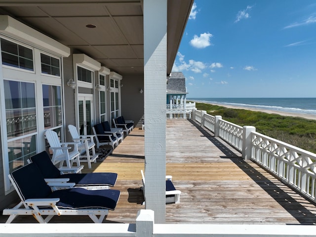 3450 Smiths Pt, Crystal Beach, TX 77650 - deck with a beach view and a water view