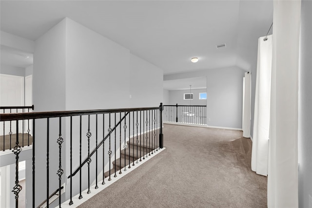 hallway with carpet