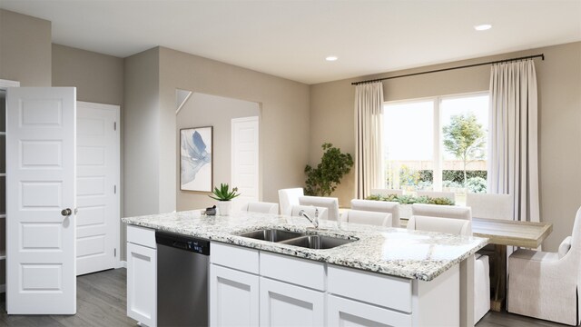 kitchen with dishwasher, light stone countertops, sink, and white cabinets