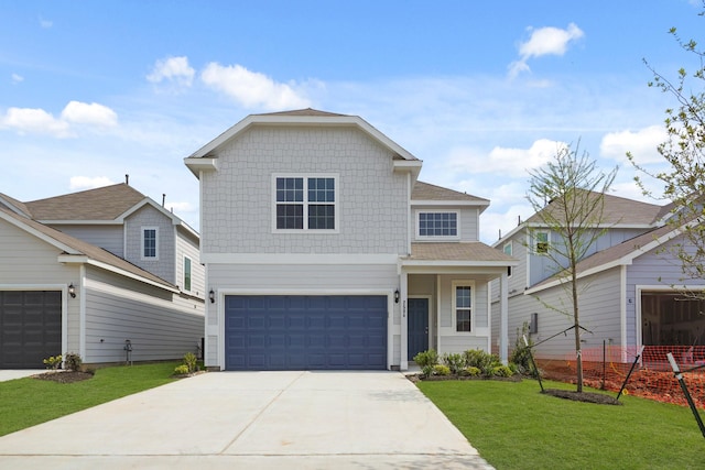 traditional-style house with concrete driveway, roof with shingles, a front lawn, and an attached garage