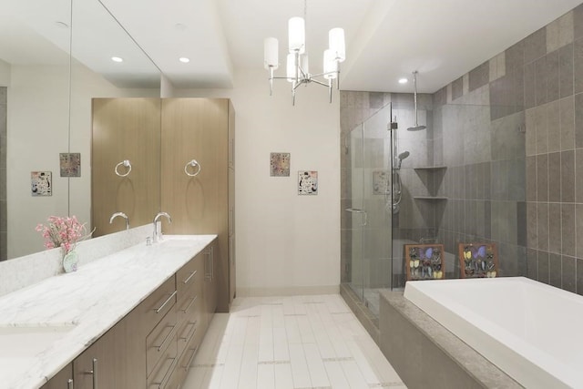 bathroom featuring vanity, a notable chandelier, tile patterned floors, and plus walk in shower