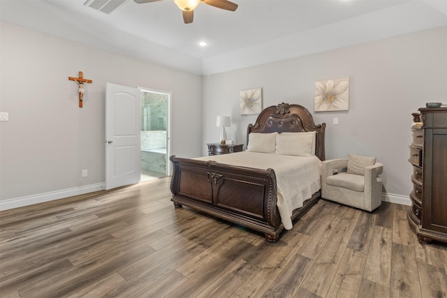 bedroom with lofted ceiling, wood-type flooring, ceiling fan, and ensuite bathroom