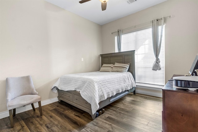 bedroom featuring dark wood-type flooring and ceiling fan