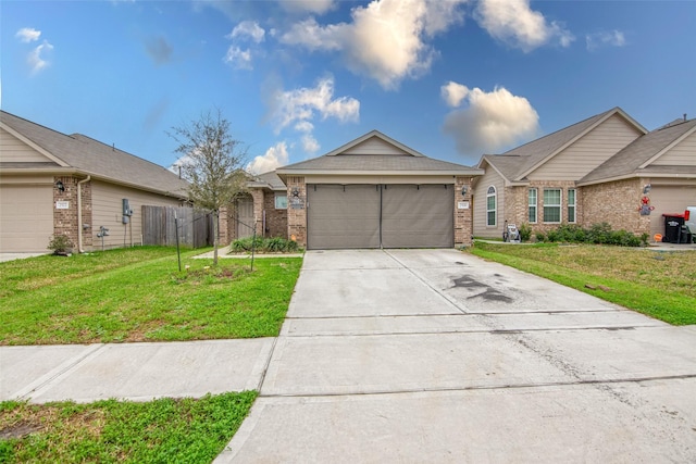 ranch-style house featuring a garage and a front yard