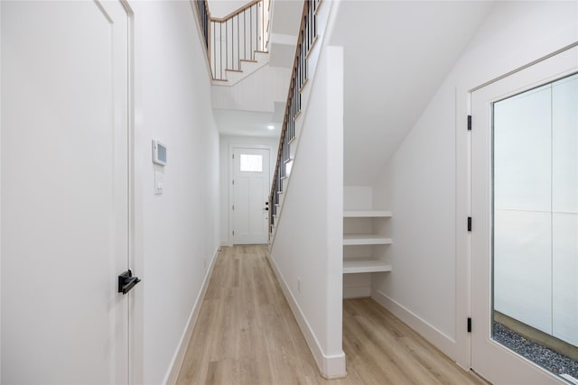 corridor featuring light hardwood / wood-style floors