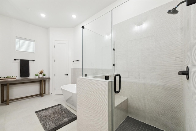 bathroom with tile patterned flooring and plus walk in shower