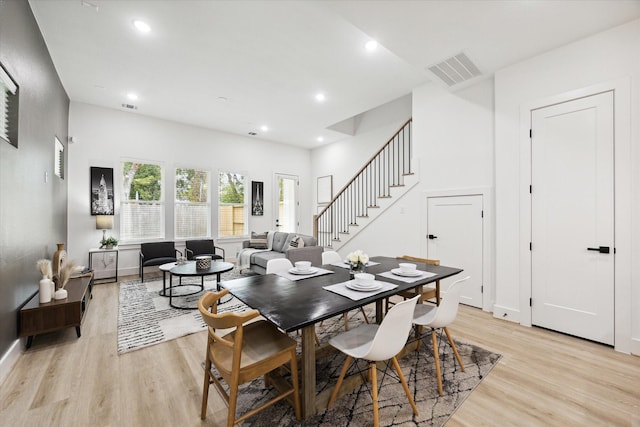 dining space featuring light hardwood / wood-style flooring