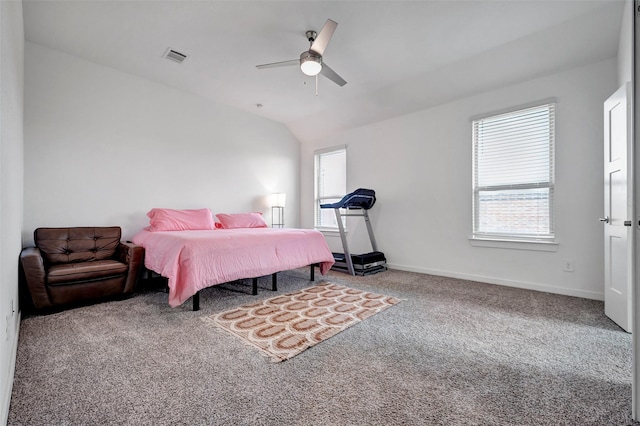 carpeted bedroom featuring vaulted ceiling and ceiling fan