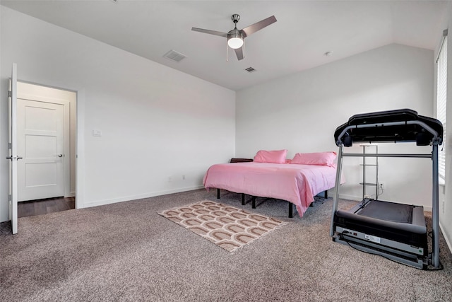 bedroom featuring ceiling fan, vaulted ceiling, and carpet