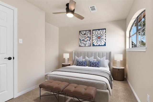 carpeted bedroom with ceiling fan