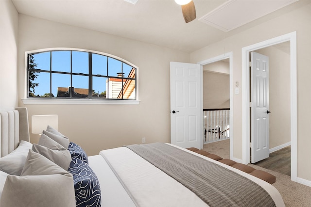 bedroom with ceiling fan and carpet