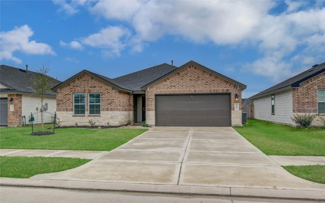 single story home featuring central AC, a garage, and a front lawn