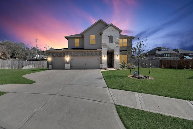 view of front of house with a front yard, stone siding, and fence