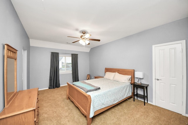 bedroom with ceiling fan and light colored carpet