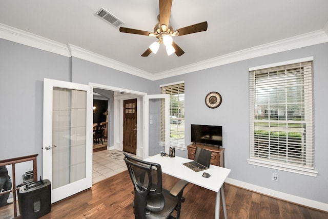 office with wood-type flooring, french doors, and a healthy amount of sunlight