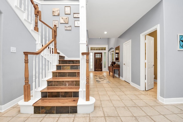 entrance foyer featuring light tile patterned floors