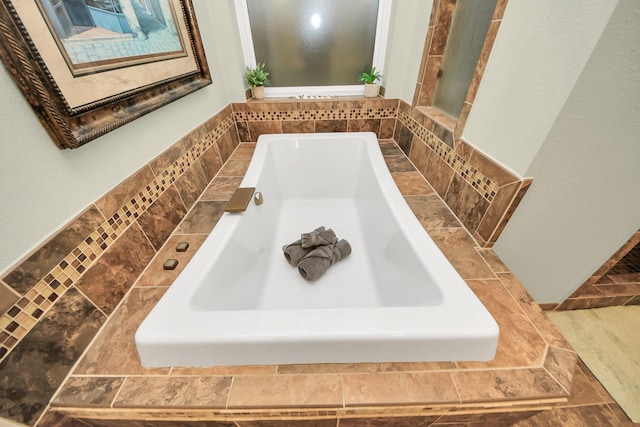 bathroom with a washtub