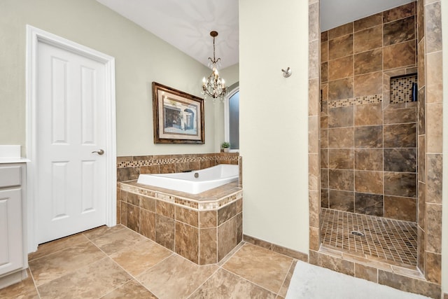 bathroom featuring plus walk in shower and a notable chandelier