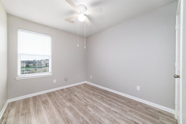 unfurnished room with ceiling fan and light hardwood / wood-style floors