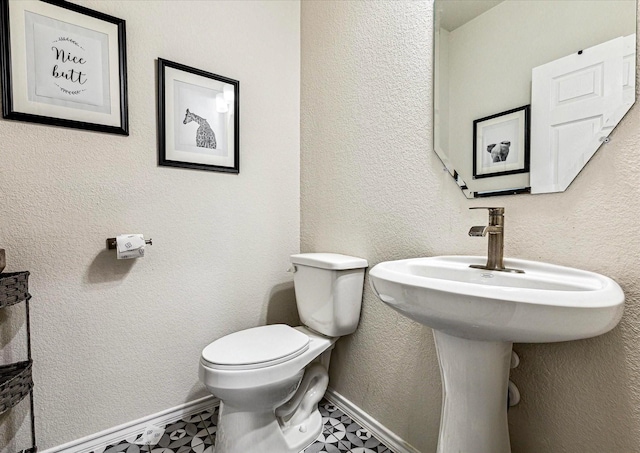 bathroom featuring toilet