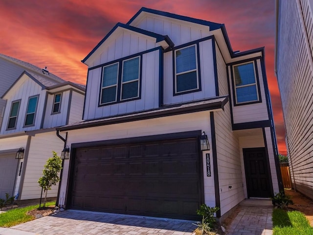 view of front of home with a garage