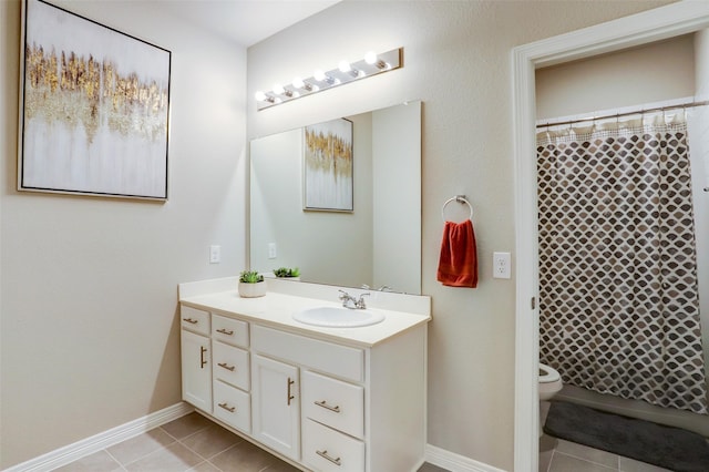 bathroom featuring a shower with curtain, vanity, toilet, and tile patterned flooring