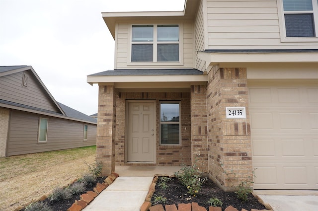 property entrance featuring a garage