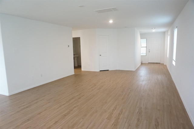 empty room featuring light hardwood / wood-style floors