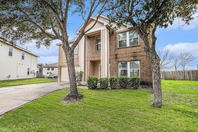 front of property with a front lawn and a garage