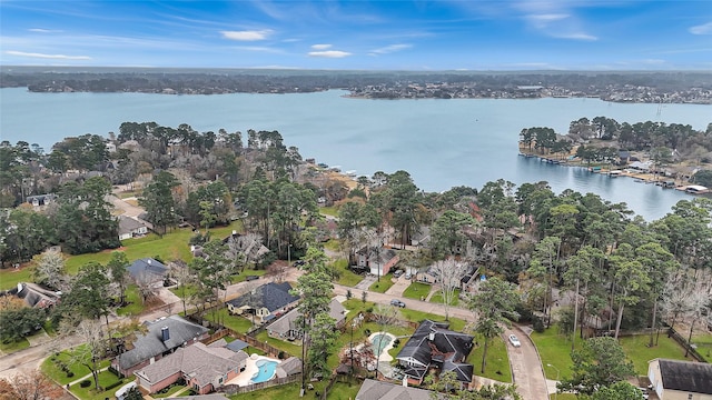 bird's eye view featuring a water view and a residential view