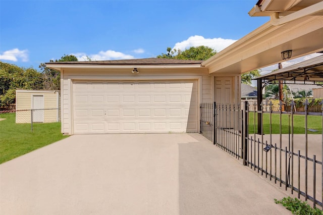 garage featuring a lawn