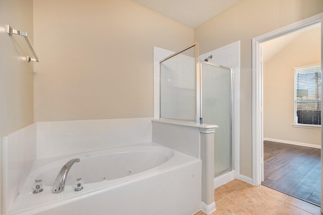 11430 Alcott Dr, Montgomery, TX 77356 - bathroom featuring tile patterned floors and plus walk in shower