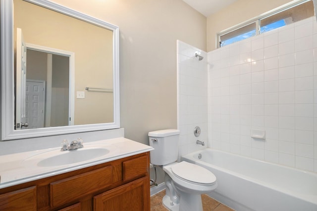 11430 Alcott Dr, Montgomery, TX 77356 - full bathroom with tile patterned floors, toilet, vanity, and tiled shower / bath combo