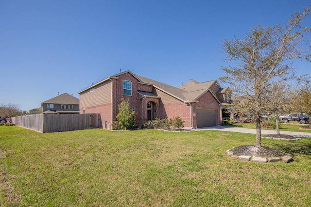 view of property exterior with fence, driveway, a garage, a lawn, and brick siding