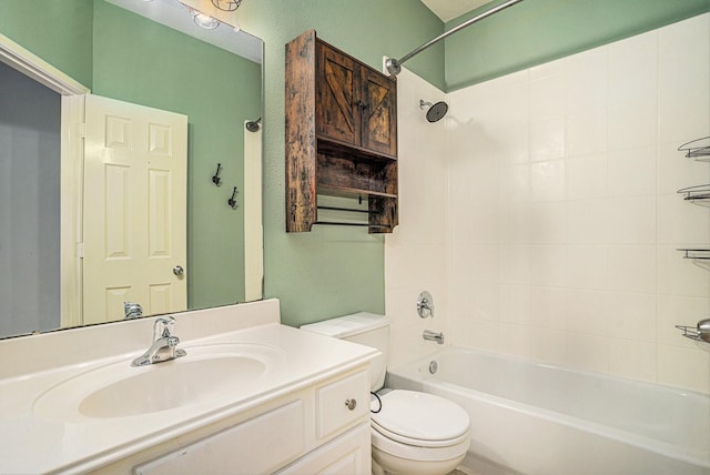 full bathroom with tiled shower / bath combo, vanity, and toilet