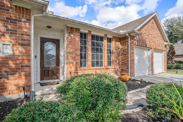property entrance with a garage