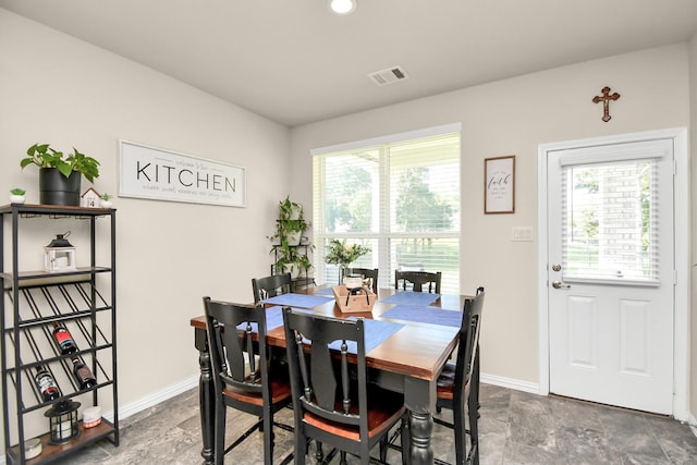 dining space with plenty of natural light