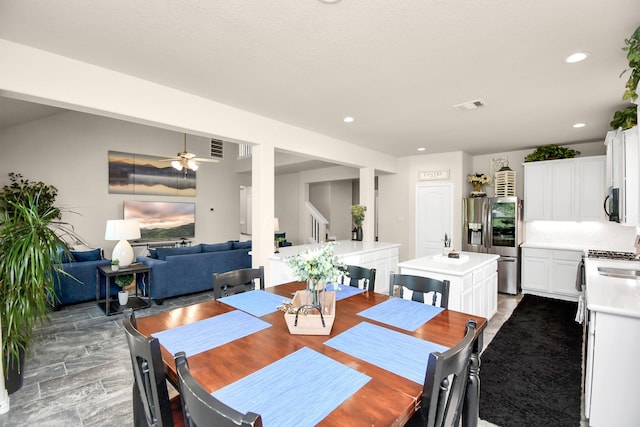 dining space with ceiling fan