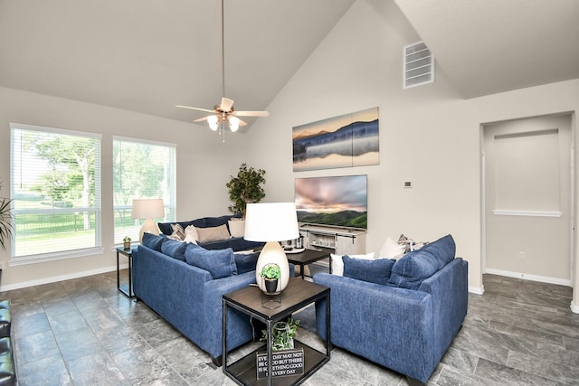 living room with high vaulted ceiling and ceiling fan